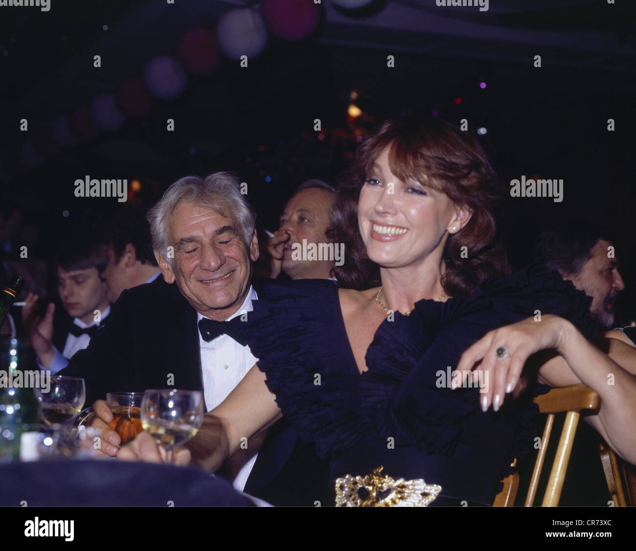 Schuermann, Petra, 15.9.1935 - 13.1.2010, German actress, TV presenter, half length, with Leonard Bernstein, Mathaeser Film Ball, Munich, Germany, 1981, Stock Photo
