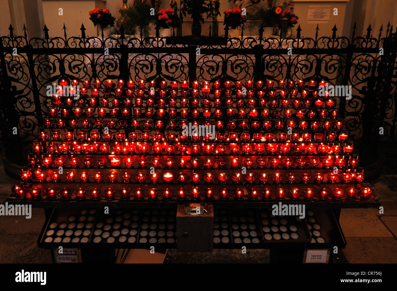 Votive candles in the Roman Catholic Theatine Church St. Cajetan, late