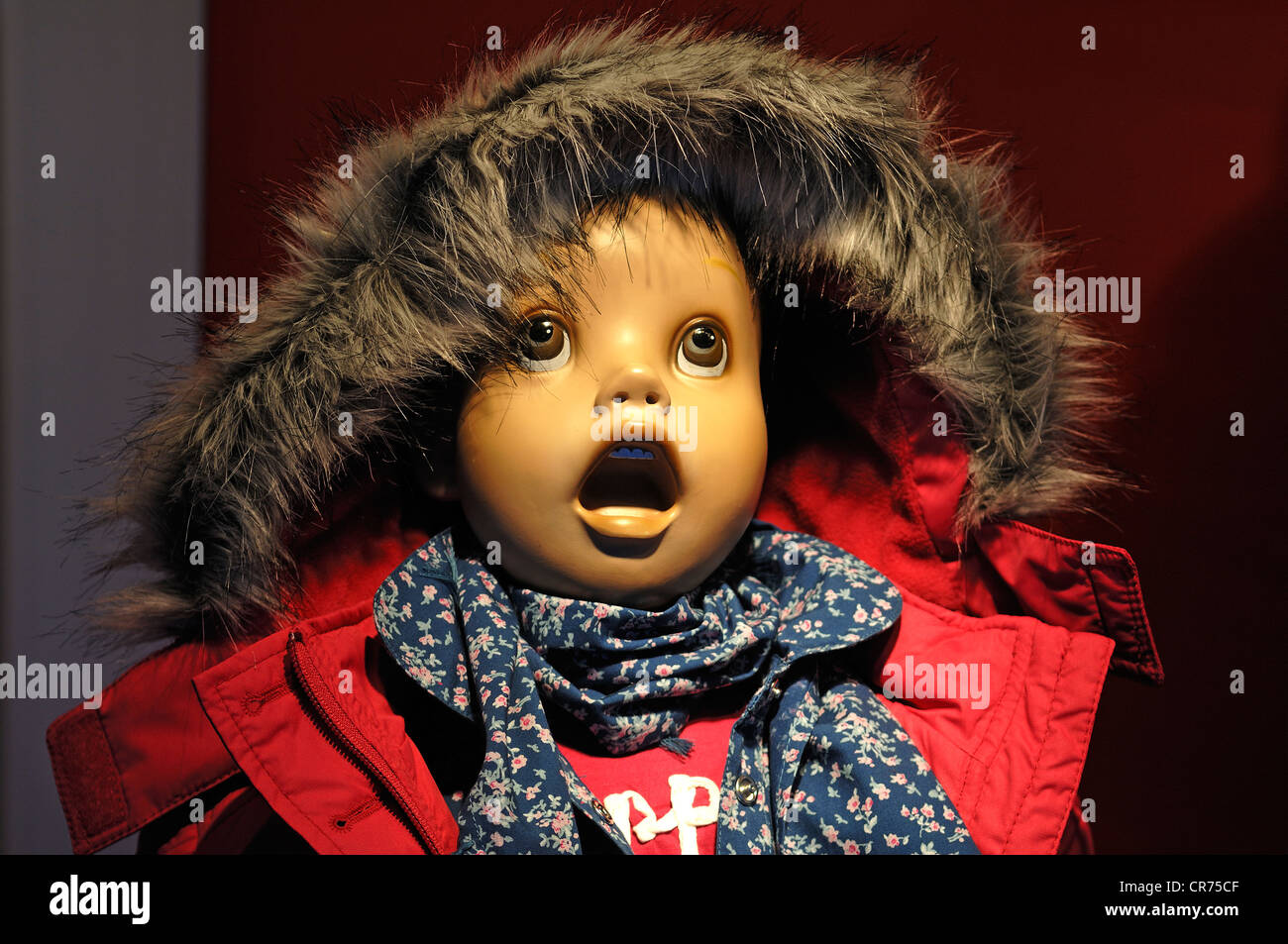 Astonished child mannequin with big eyes and open mouth in a fashion store, Fuerth, Middle Franconia, Bavaria, Germany, Europe Stock Photo