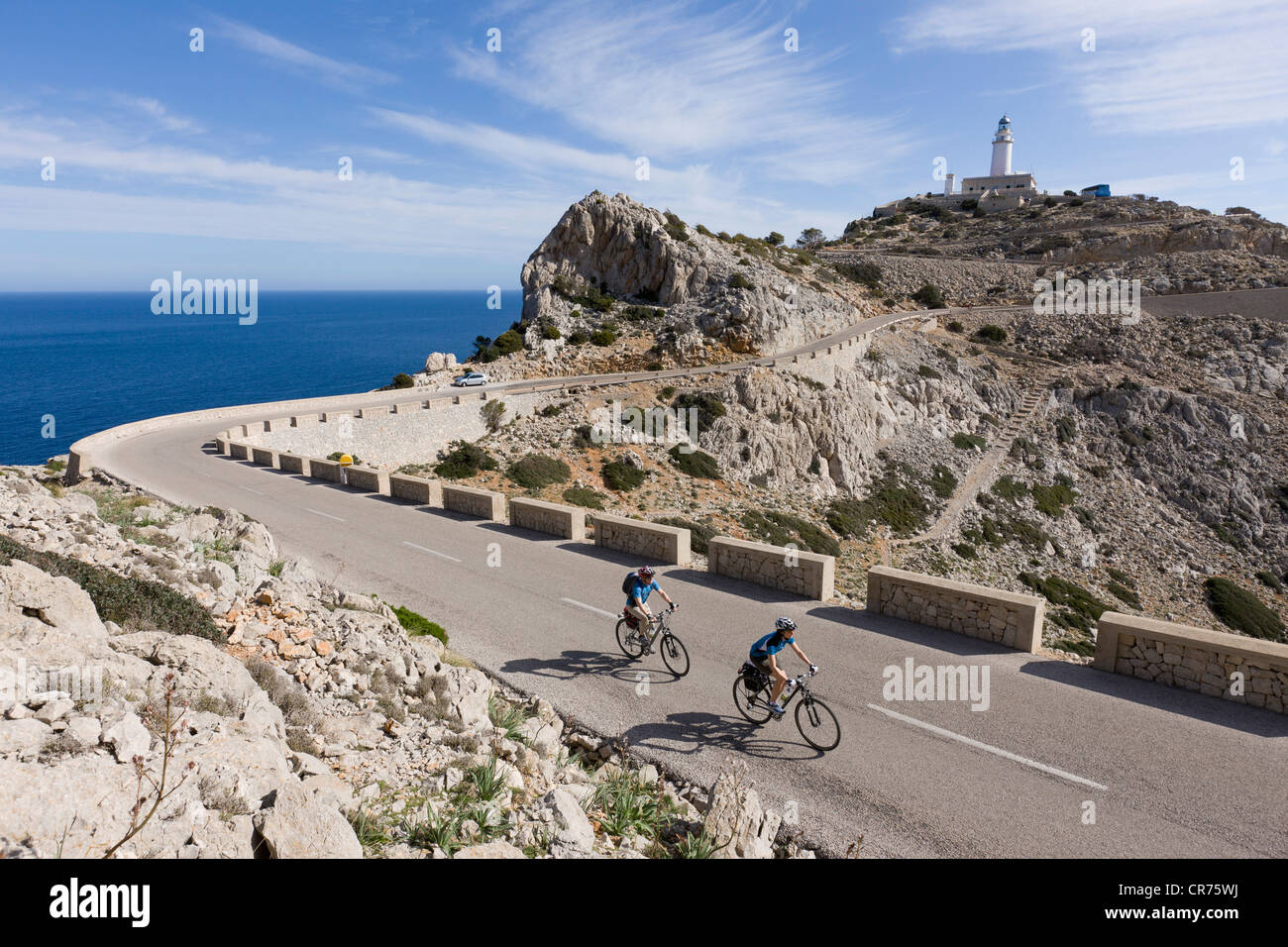 Spain, Mallorca, Man and woman cycling on road at Cap de Formentor Stock  Photo - Alamy
