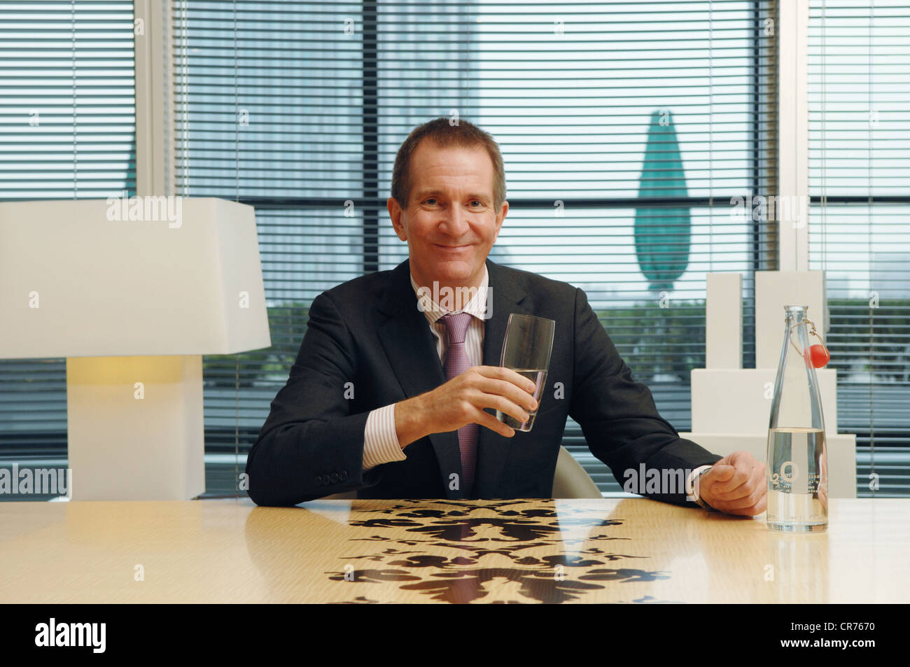 Allen Overy Senior Partner David Morley Sitting At A Desk With A