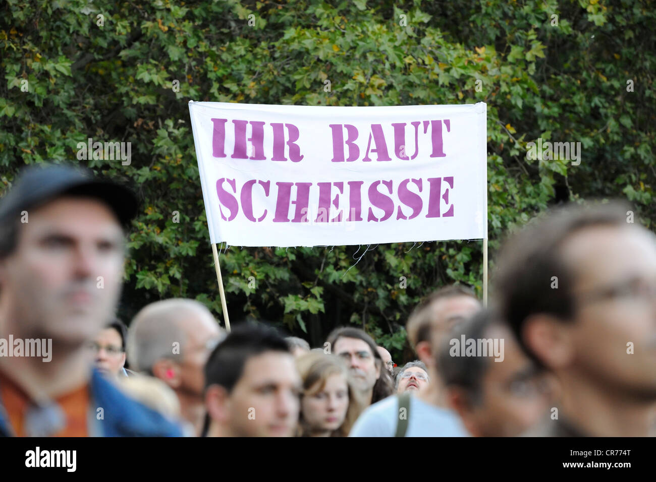 Protesters with banner 'Ihr baut Scheisse', German for 'you build shit' in Stuttgart 21 demonstration, Stuttgart Stock Photo