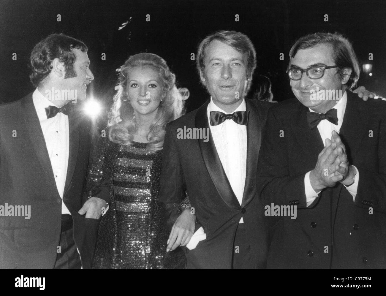 Chabrol, Claude, 24.6.1930 - 12.9.2010, French director (right) with Jean Yanne, Caroline Cellier and Michel Duchaussoy, Night of the Normandy cinema, Champs Elysees, Paris, 4.9.1969, Stock Photo