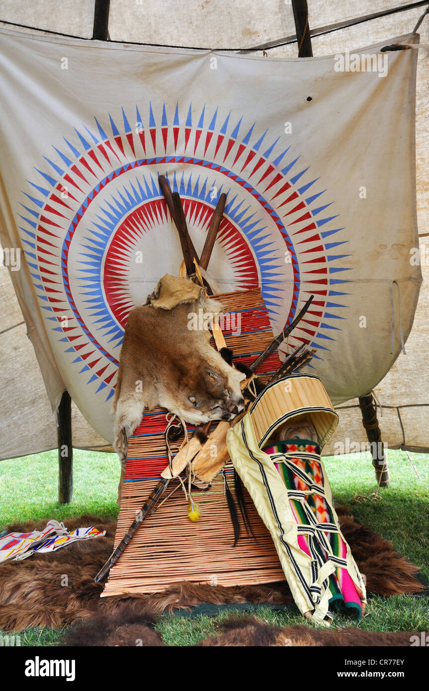Native Indians' household in a tipi, USA - papoose, or a baby carrier Stock Photo