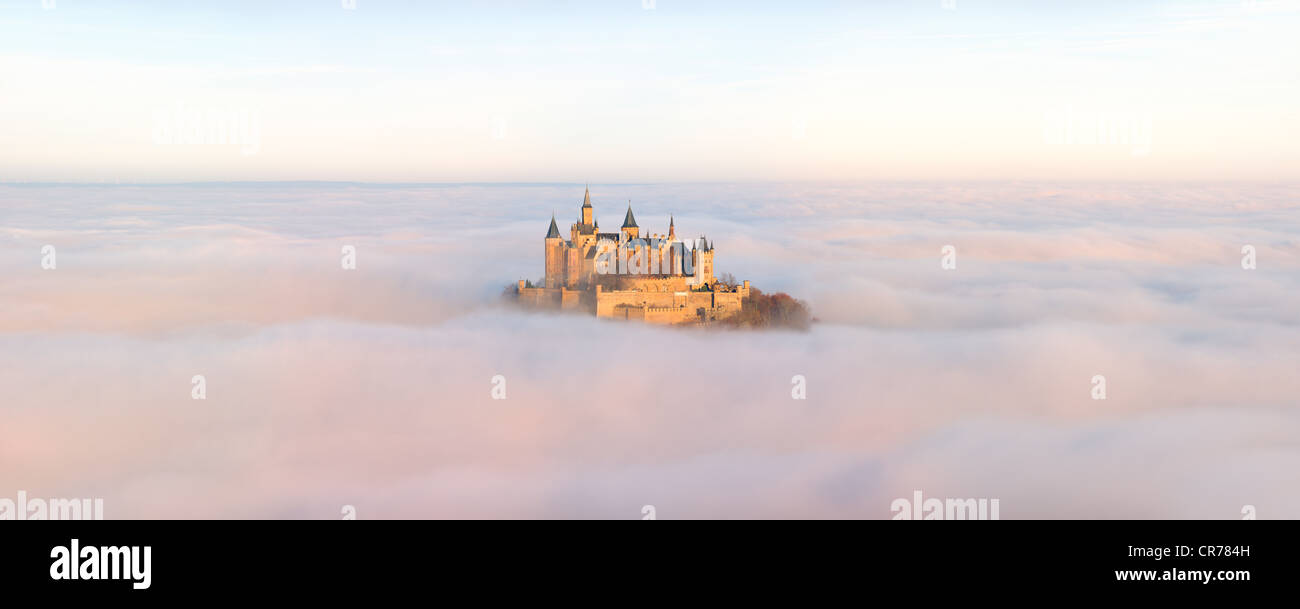 Burg Hohenzollern castle in morning light, mist, Schwaebische Alb, Swabian Alb, Baden-Wuerttemberg, Germany, Europe Stock Photo