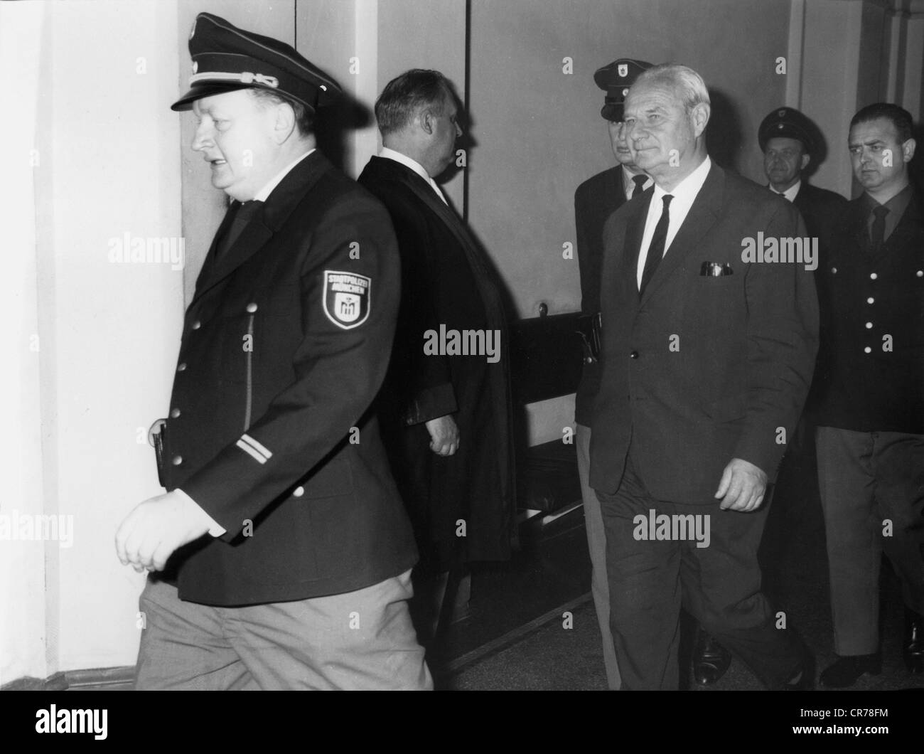 Wolff, Karl, 13.5.1900 - 17.7.1984, German general of Waffen-SS, trial before district court Munich II, on the way to the court room, 22.9.1964, Stock Photo