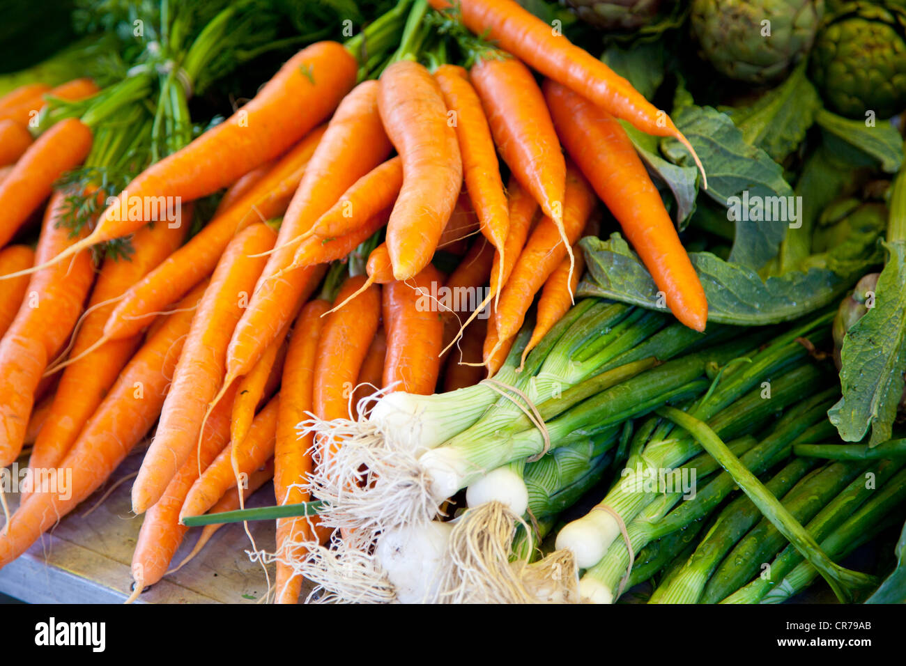 Fresh vegetables at market stall Stock Photo - Alamy