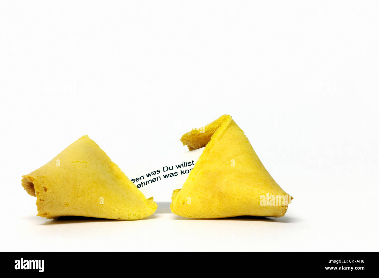 Opened Chinese fortune cookie with a wise message Stock Photo Alamy