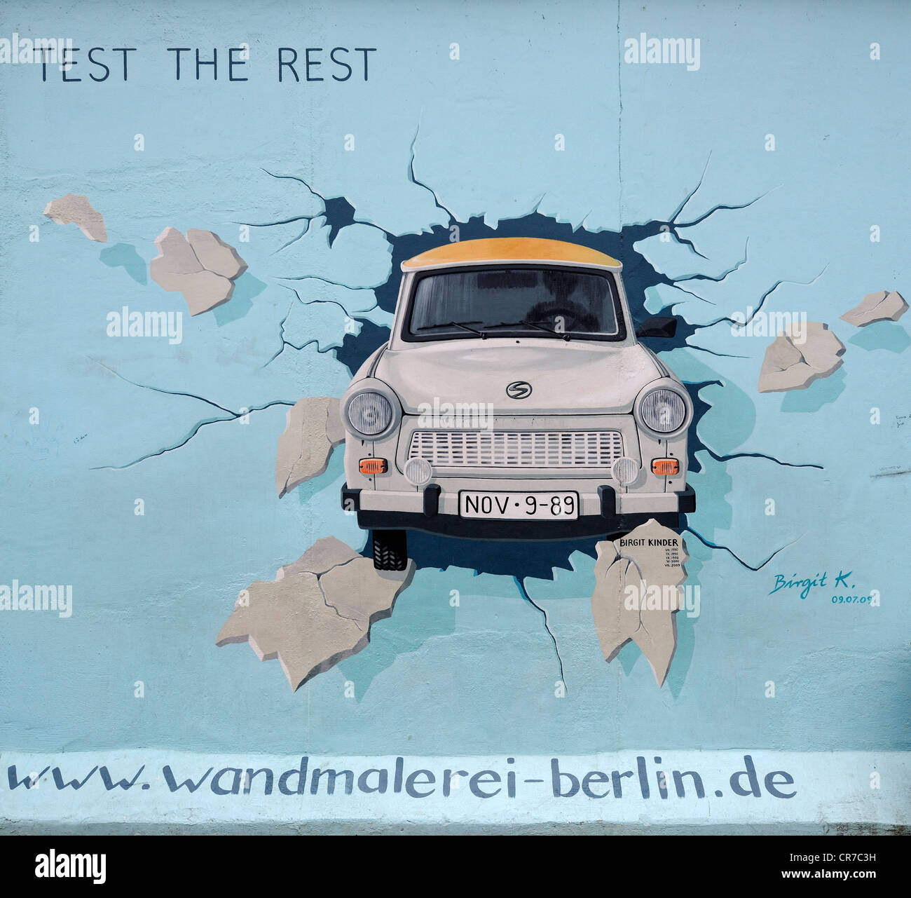 Test the Rest, Trabant breaking through the Berlin Wall, by Birgit Kinder, painting on the Berlin Wall, East Side Gallery Stock Photo