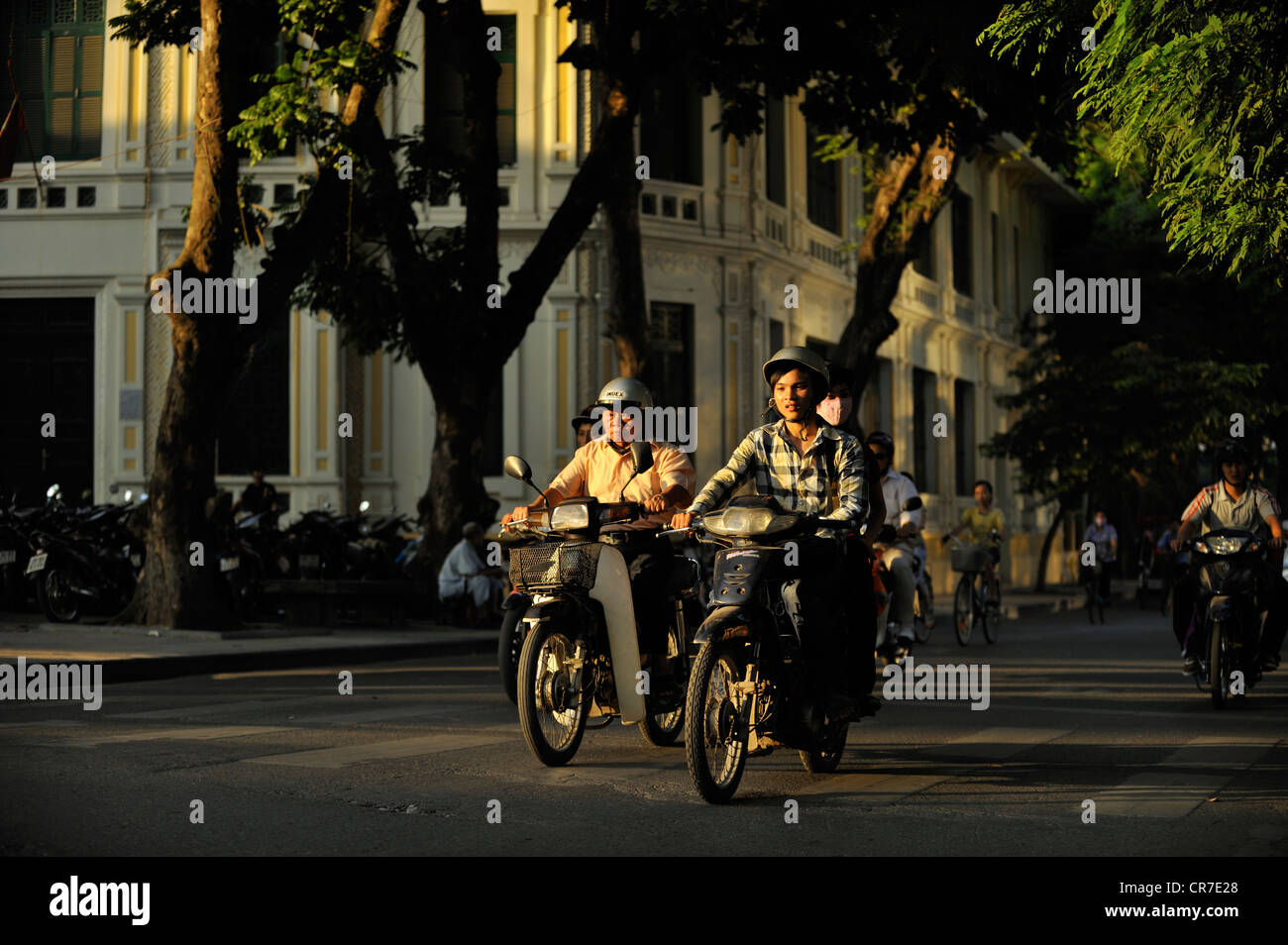 Vietnam, Hanoi, old town, traffic around Hoan Kiem Lake (also called the small lake or Lake of the Restored Sword) Stock Photo