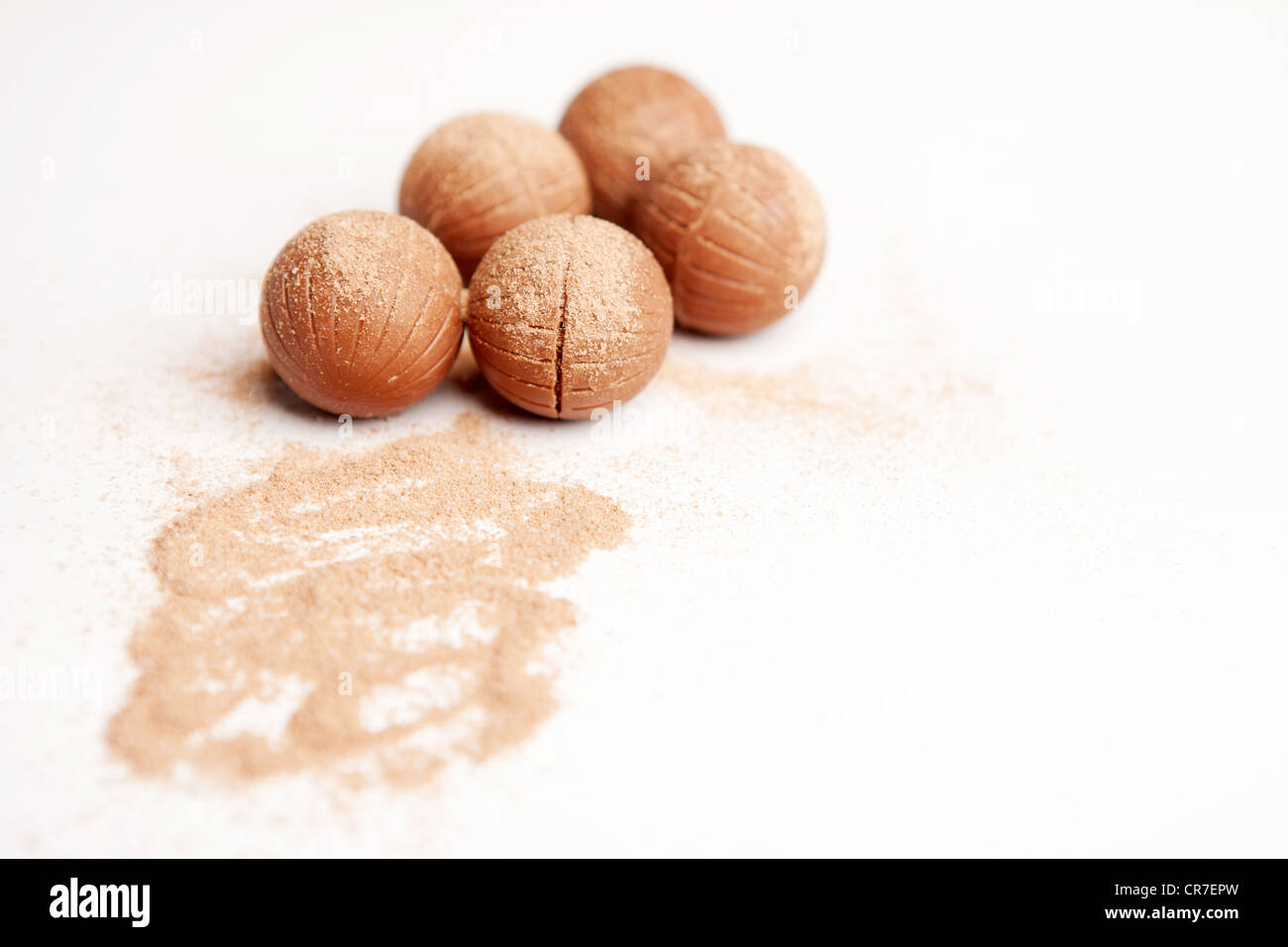 Five milk chocolate truffles with a dusting of cocoa powder Stock Photo ...