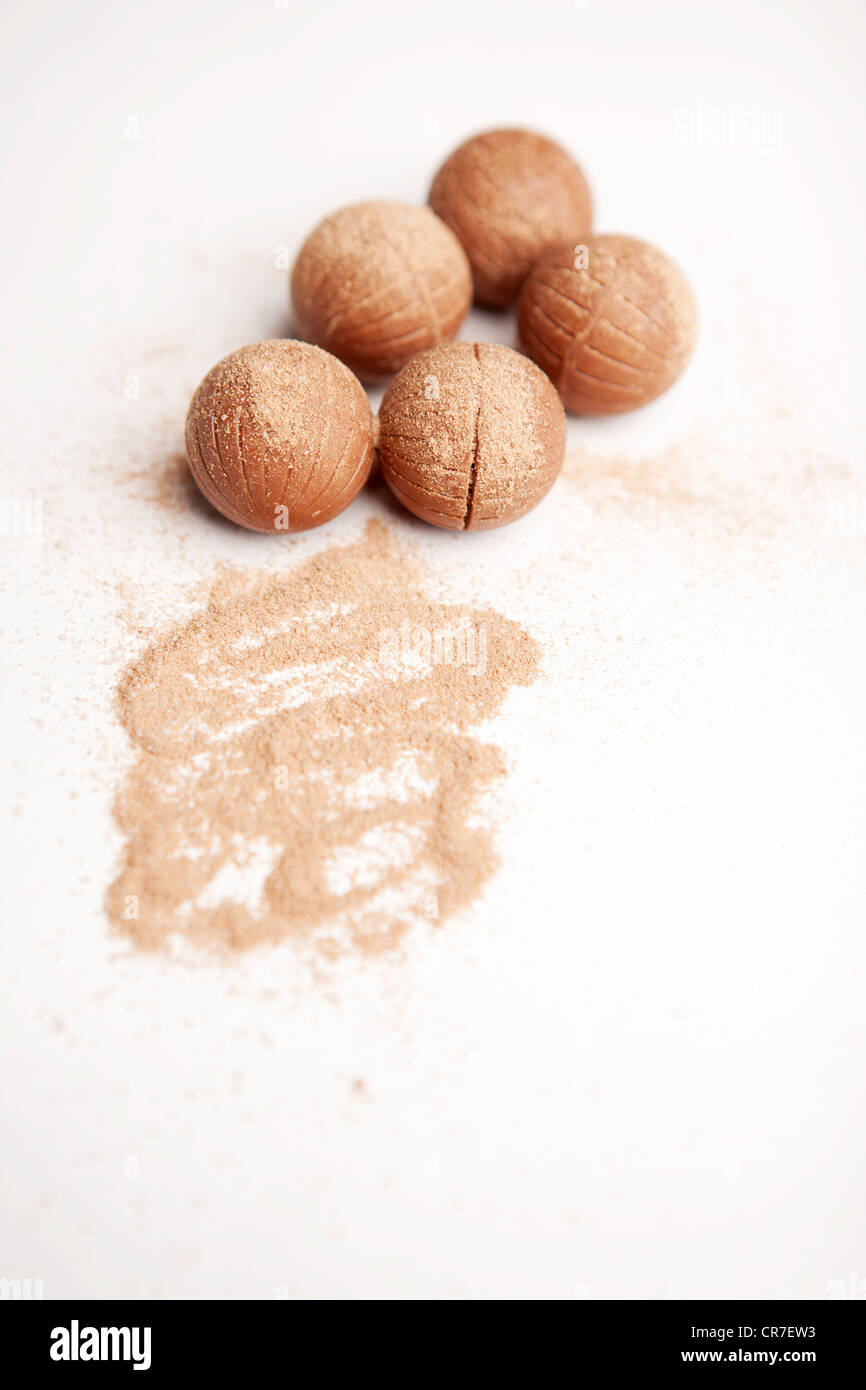 Five milk chocolate truffles with a dusting of cocoa powder Stock Photo ...