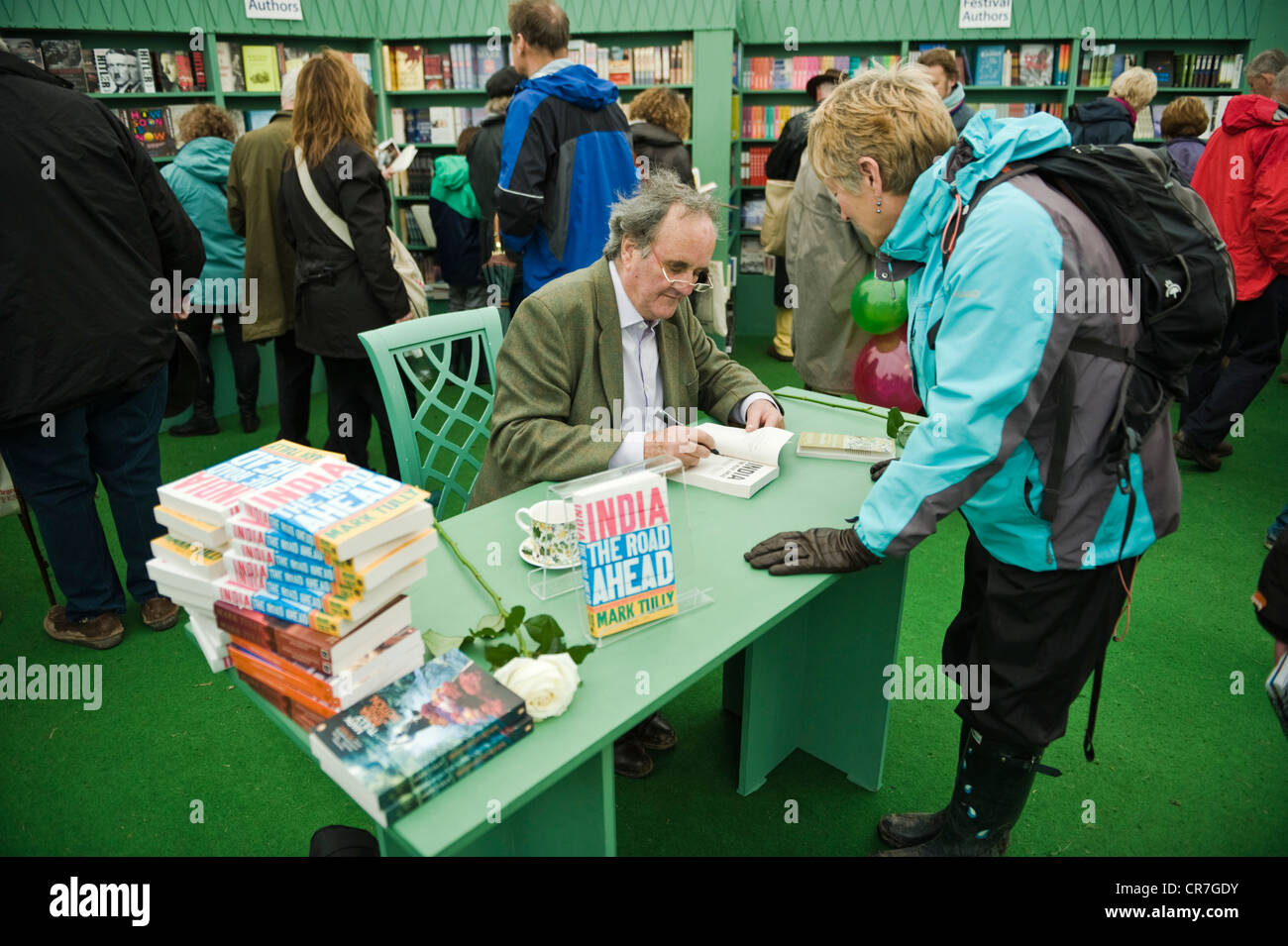 Mark Tully, journalist and writer pictured book signing at The Telegraph Hay Festival 2012, Hay-on-Wye, Powys, Wales, UK Stock Photo