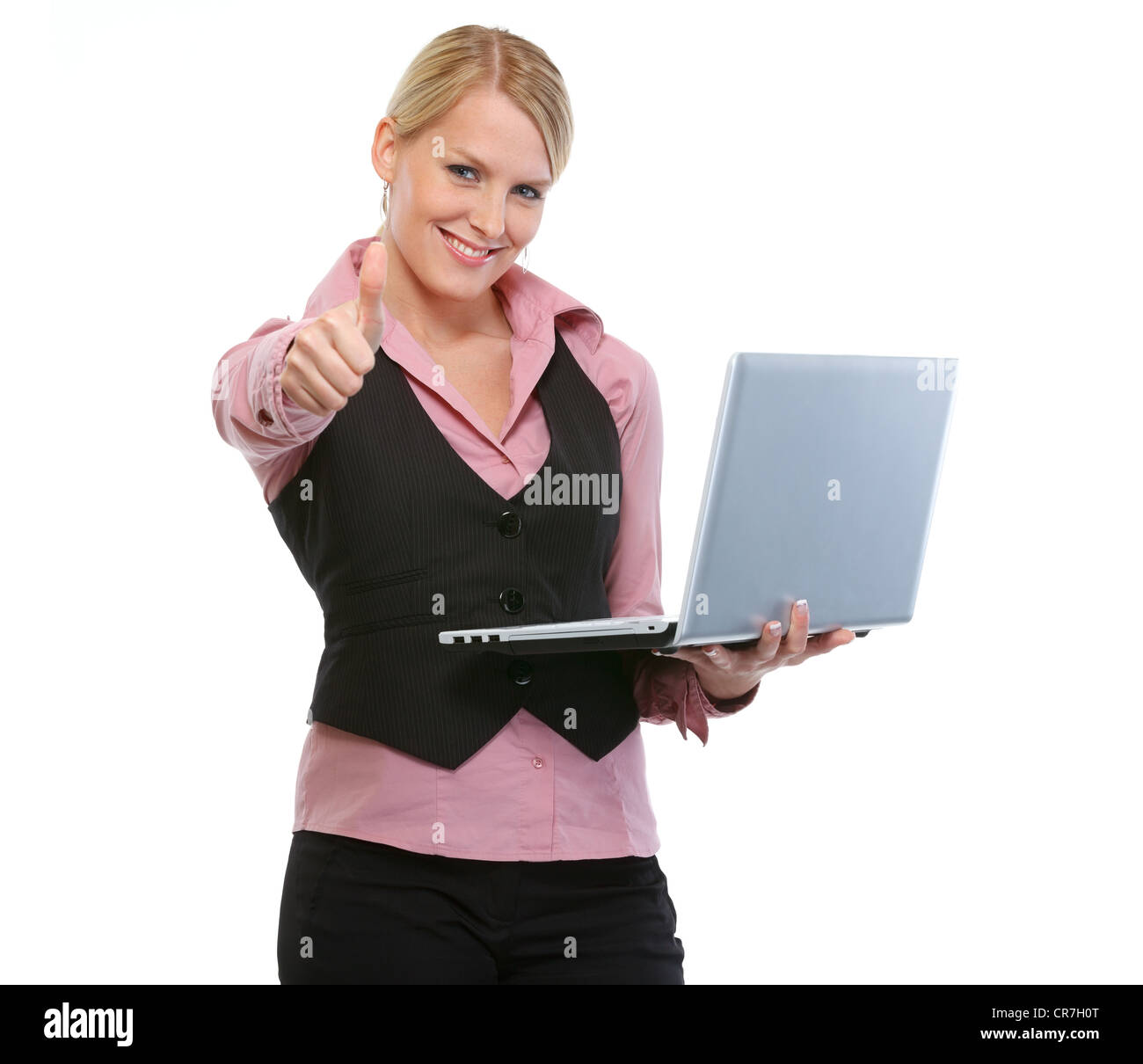 Woman with laptop showing thumbs up Stock Photo - Alamy