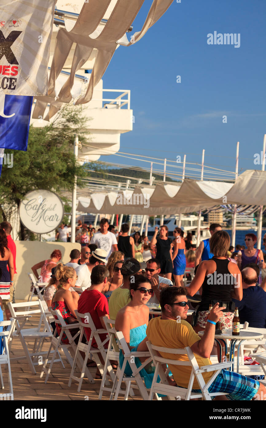 Spain, Balearic Islands, Ibiza, Sant Antoni, People watching sunset at the world famous Cafe del Mar Stock Photo