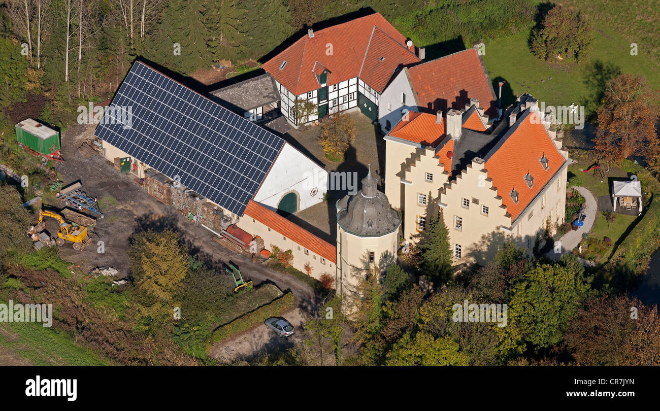 Aerial view, Haus Reck moated castle with solar panels on roof, Pelkum, Hamm, Ruhr Area, North Rhine-Westphalia, Germany, Europe Stock Photo
