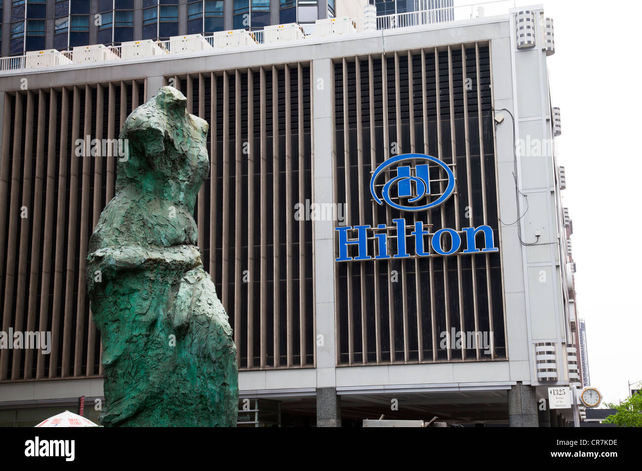 The Hilton Hotel in lower Manhattan, New York City with headless statue outside Stock Photo Alamy