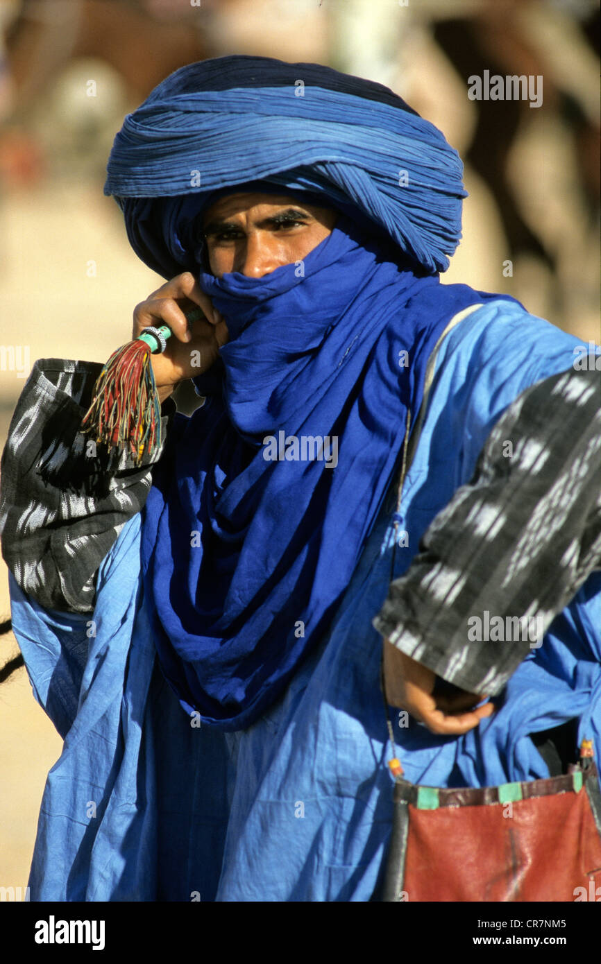 Tunisia, Southern region, Douz, Desert Festival, Tuareg in ceremonial dress on her camel Stock Photo