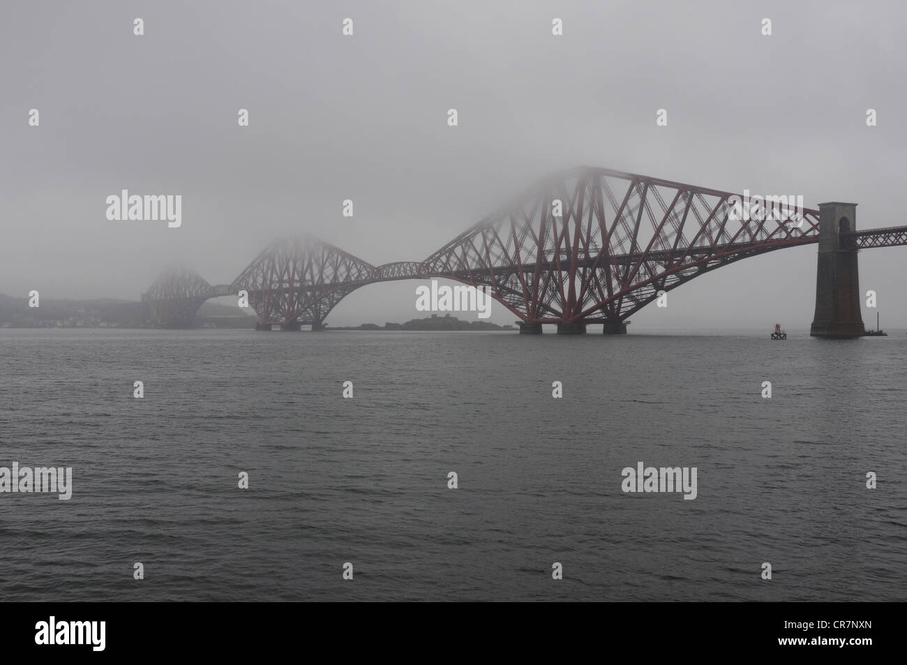 Forth (Rail) Bridge over the Firth of Forth with a slight covering from sea mist or haar Stock Photo