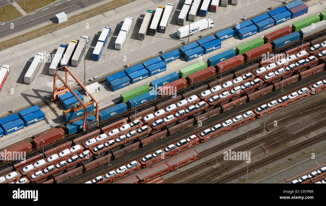 Aerial view, new cars, containers and rail loading, transportation of cars by train, Volkswagen plant, Autostadt, Wolfsburg Stock Photo