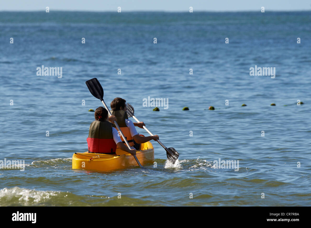 Paddle boat tour on the beach Stock Photo Alamy