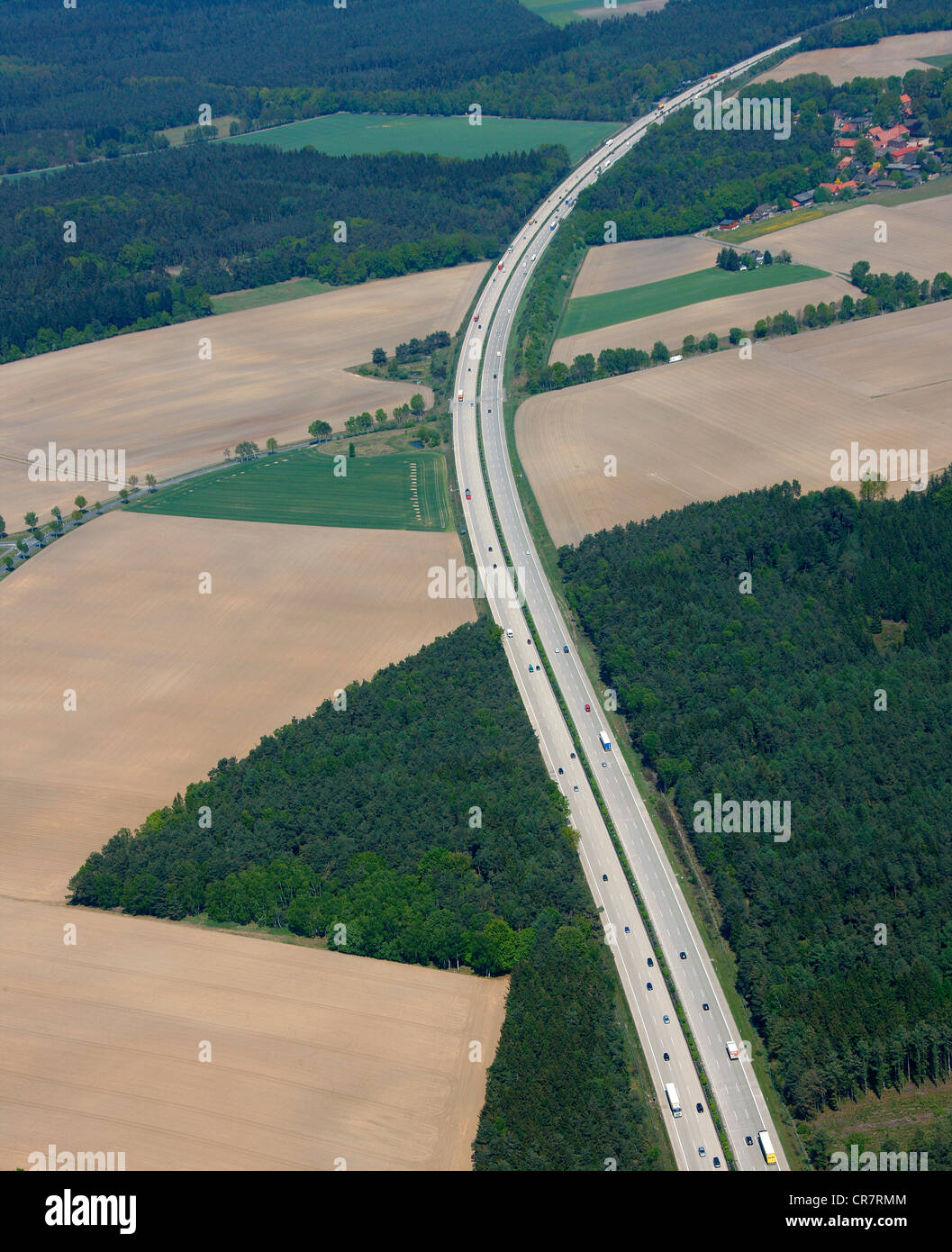 Aerial view, A7 freeway, curve, fields and forests, Bispingen, Lower Saxony, Germany, Europe Stock Photo