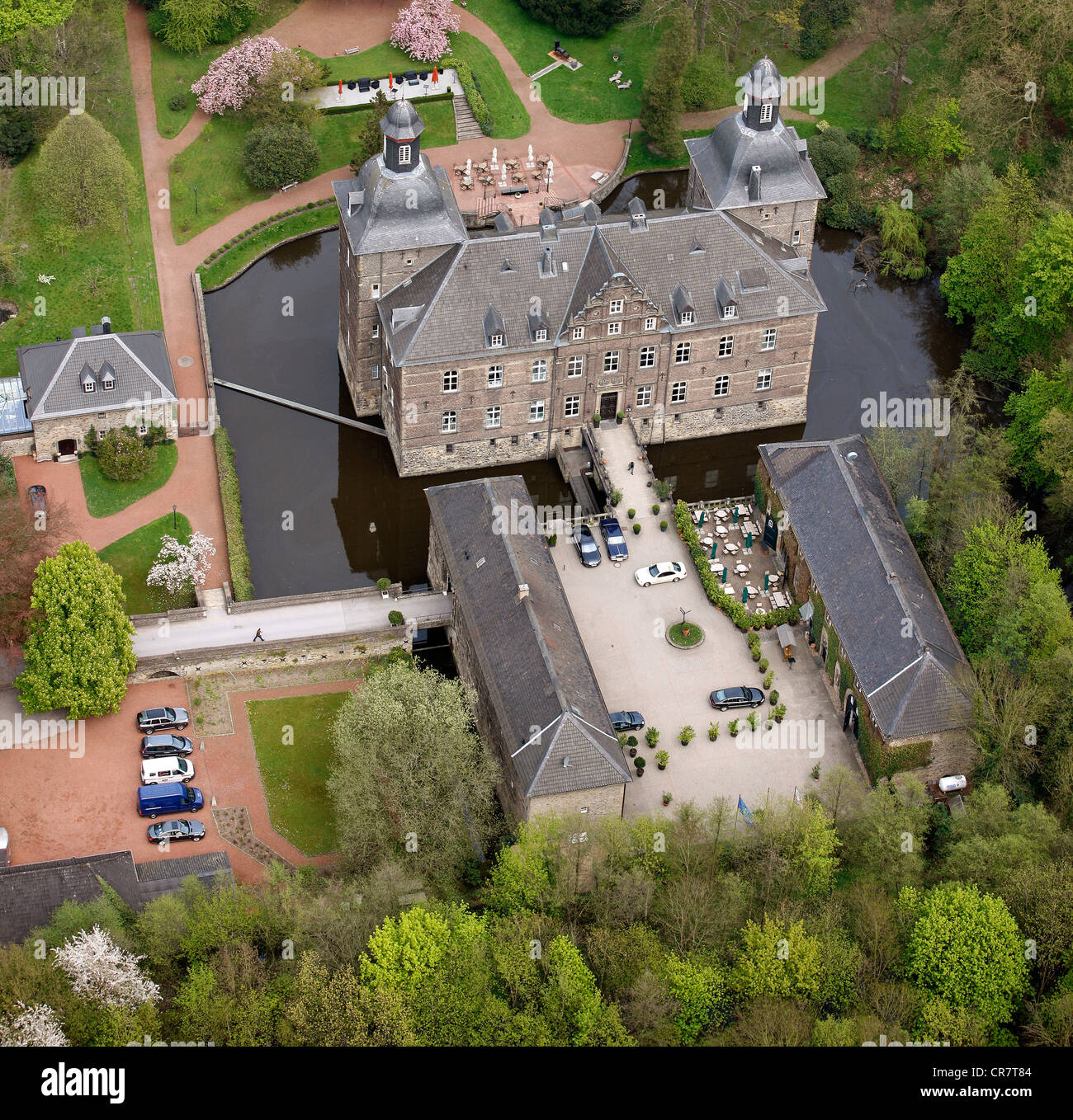 Aerial view, Schloss Hugenpoet moated castle, star restaurant and