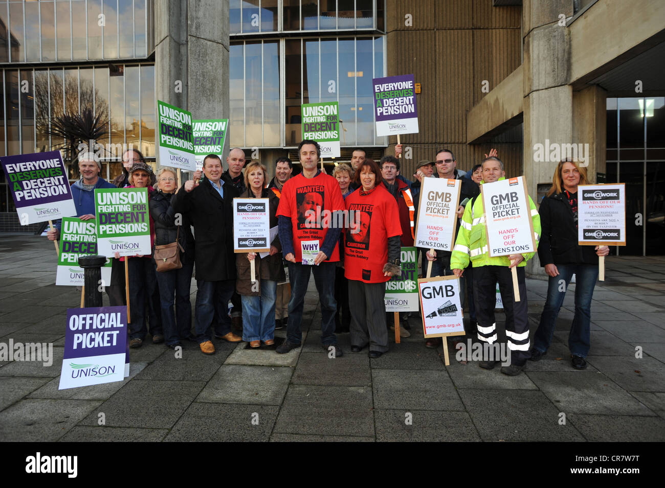 Public sector workers taking part in a one day strike to defend their pension rights picket outside Hove Town Hall Stock Photo