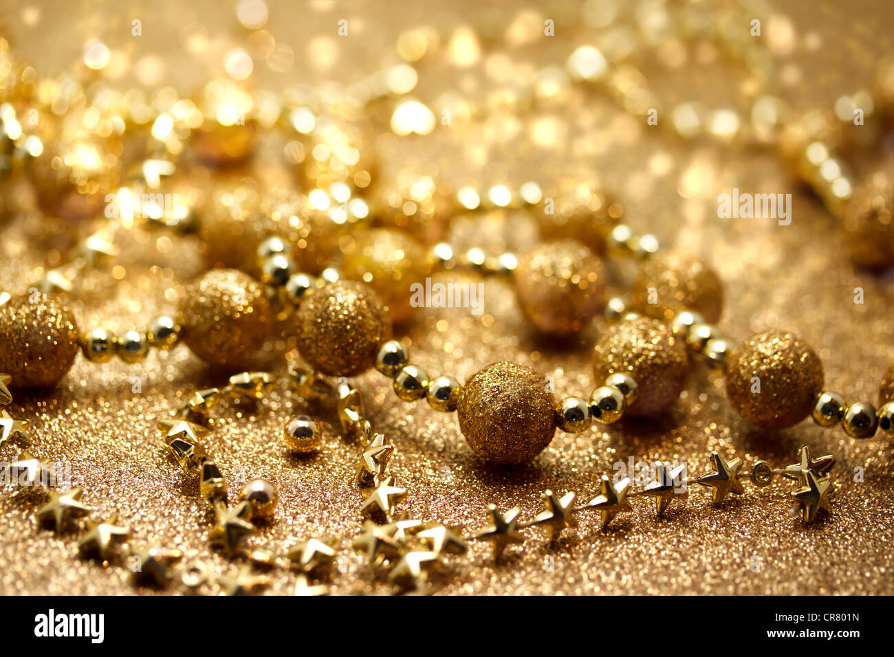 Gold string beads hi-res stock photography and images - Alamy