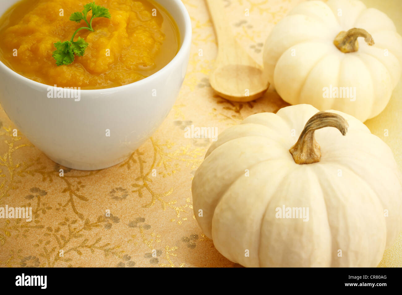 Two Pumpkins with Pumpkin Soup Stock Photo