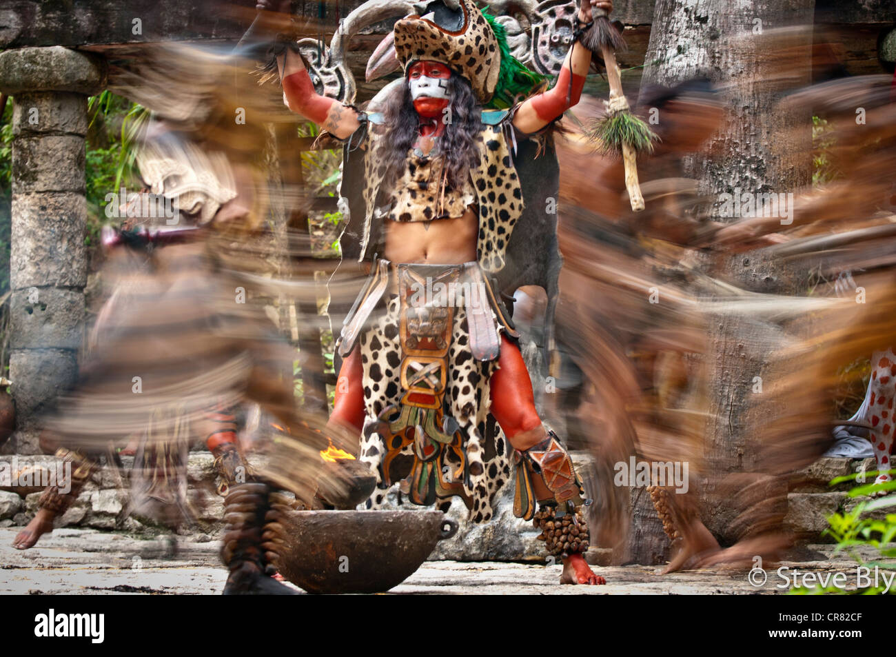 A Maya fokllore fire dance ritual is performed by mystical performers in Xcaret Show, Riviera Maya, , Quintana Roo, Mexico Stock Photo