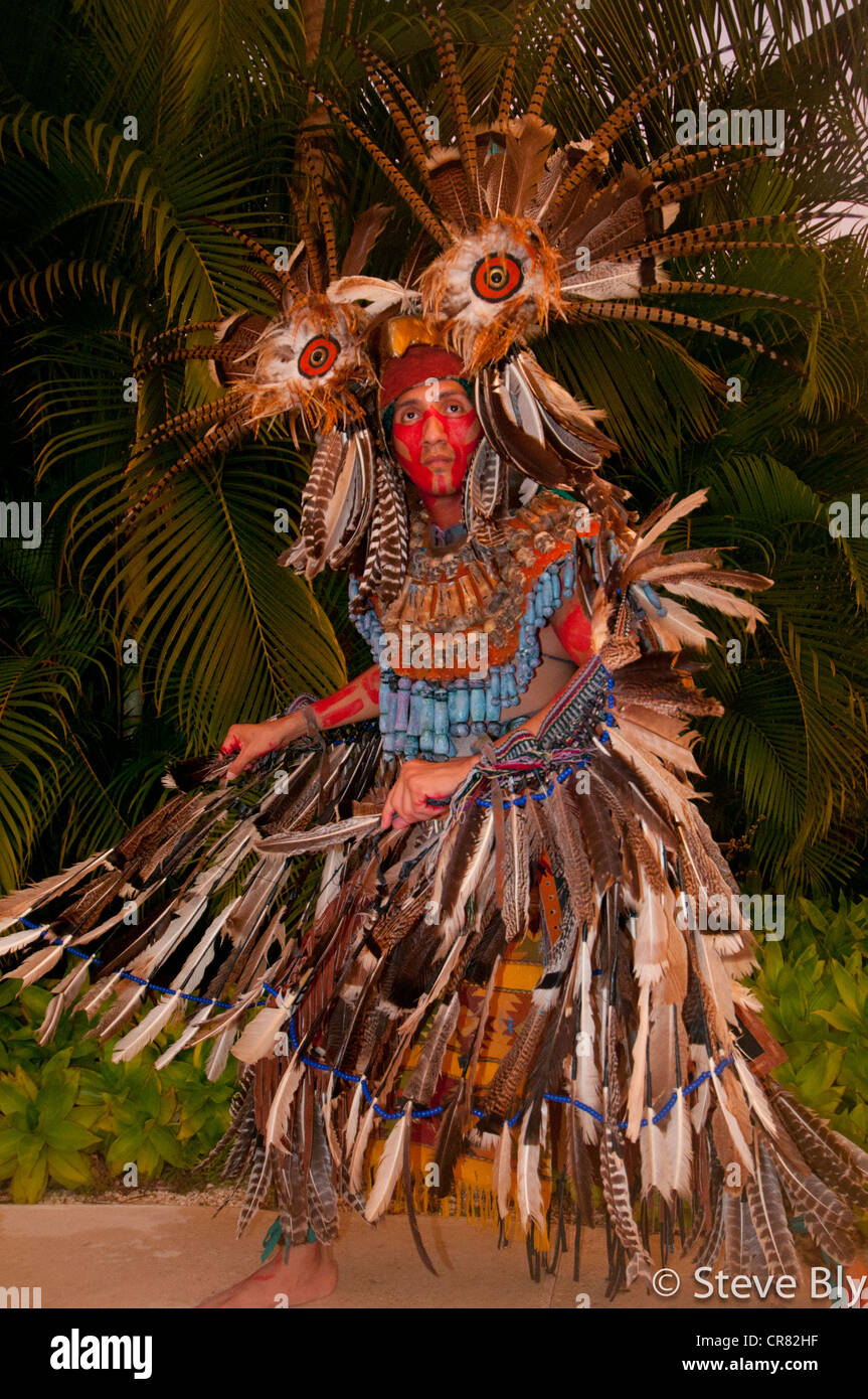 A Mayan fokllore ritual is performed by a maya performer in traditional dress, Riviera Maya, Mexico Stock Photo