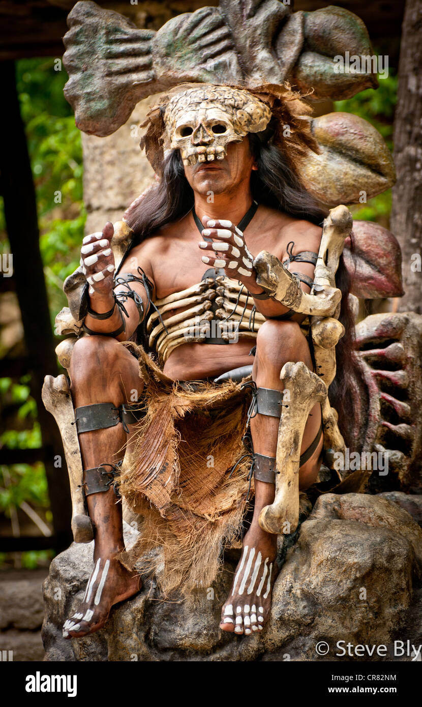 A Mayan fokllore ritual is performed by a Maya mystical performer in Xcaret Park, Riviera Maya, Mexico Stock Photo