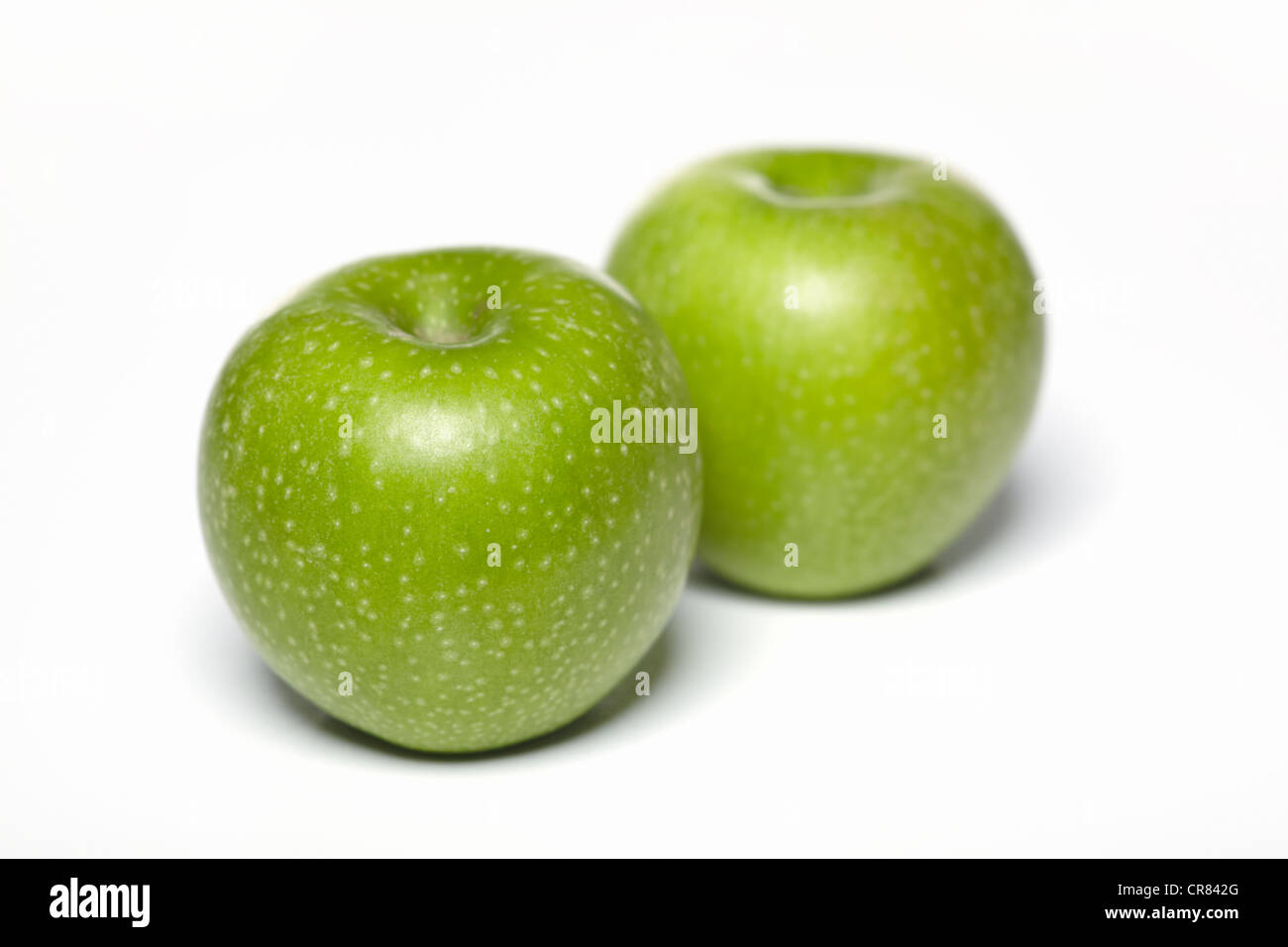 Two green Granny Smith apples Stock Photo Alamy
