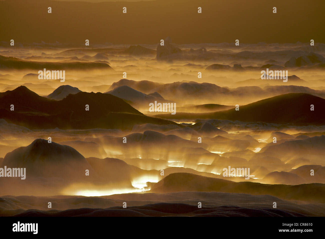 Reflection of the setting sun in the fog over the Joekulsárlón glacial lake, south coast, Iceland, Europe Stock Photo