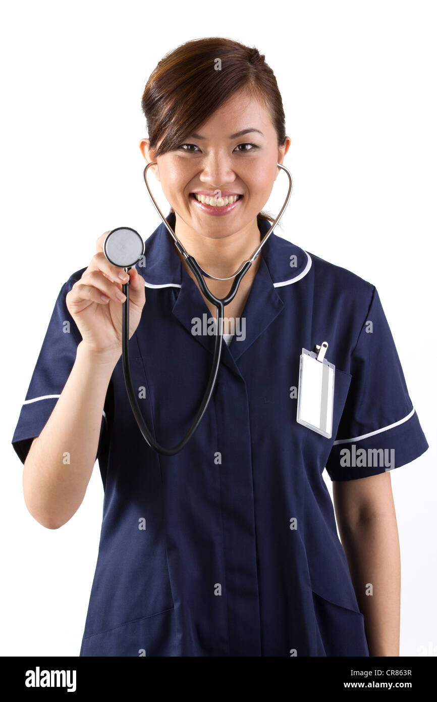 Portrait of a happy Asian Female Nurse Stock Photo