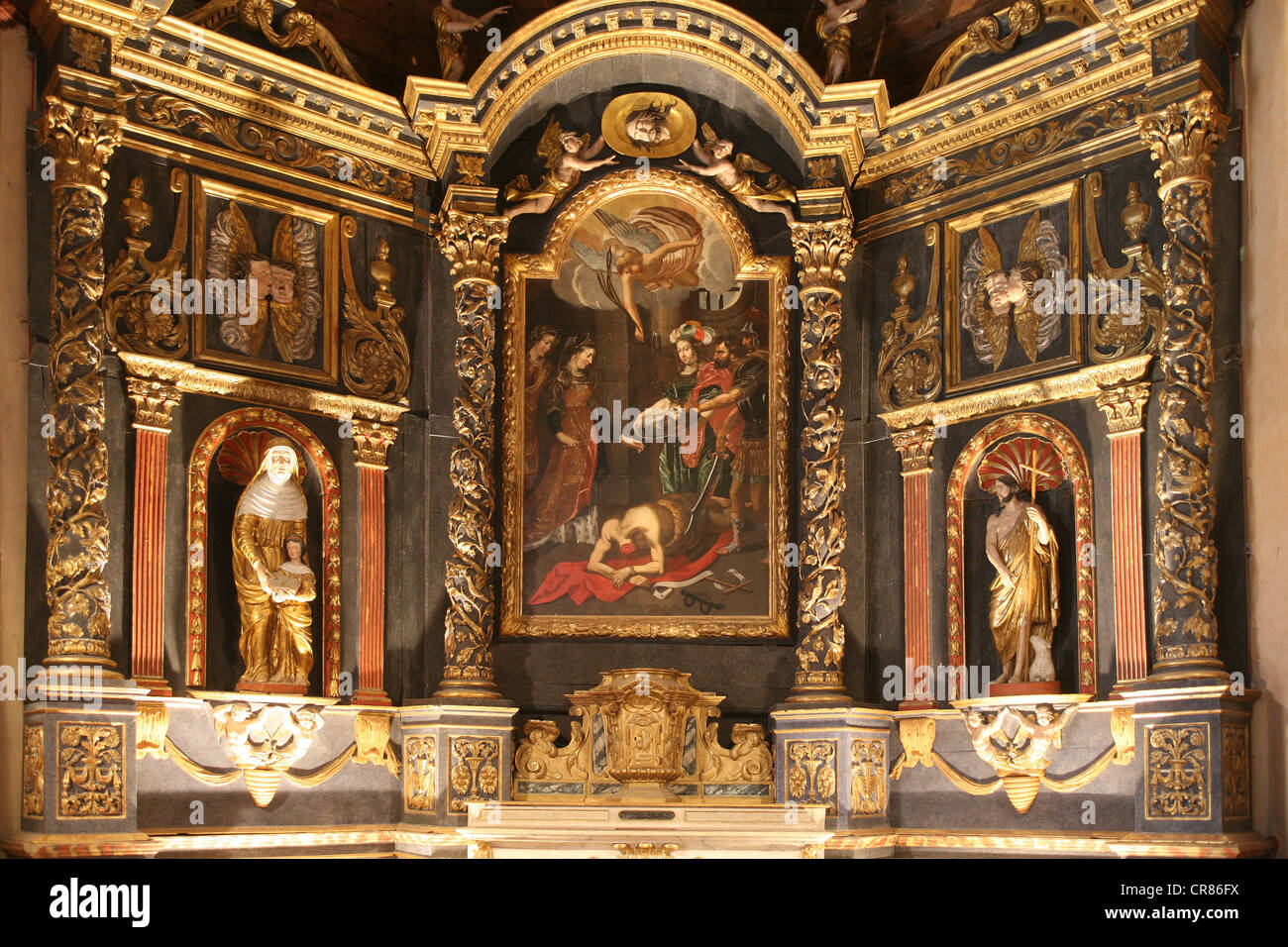 France, Aveyron, St Geniez d'Olt, gothic altarpiece of Penitents chapel Stock Photo