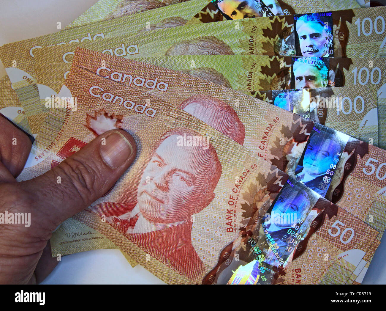 Canada's new anti-counterfeiting polymer banknotes Stock Photo