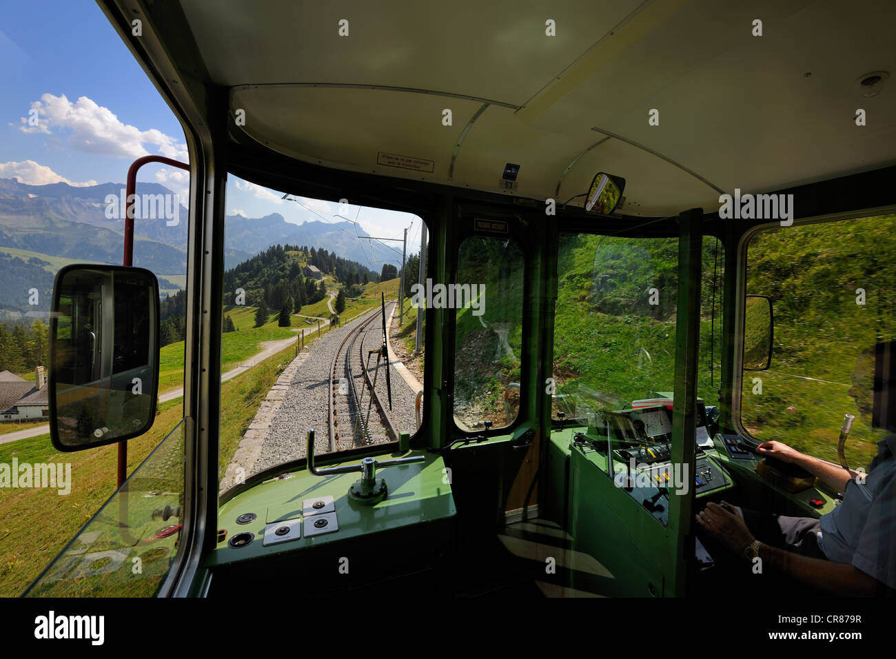 Switzerland, Canton of Vaud, Villars sur Ollon, train joining the railway station of Bretaye Stock Photo