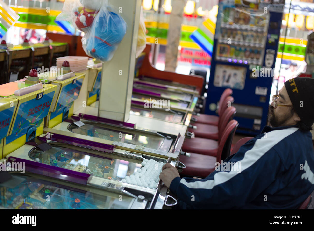 Gaming parlor with pachinko/pinball machines, In Shinsekai district, in Osaka, Kansai region, Japan. Stock Photo