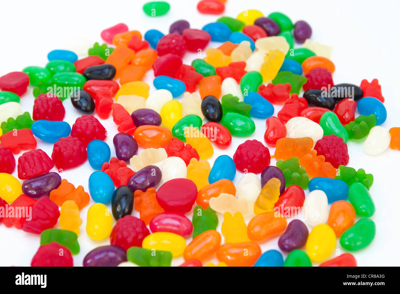 Colorful candy on a white background Stock Photo - Alamy