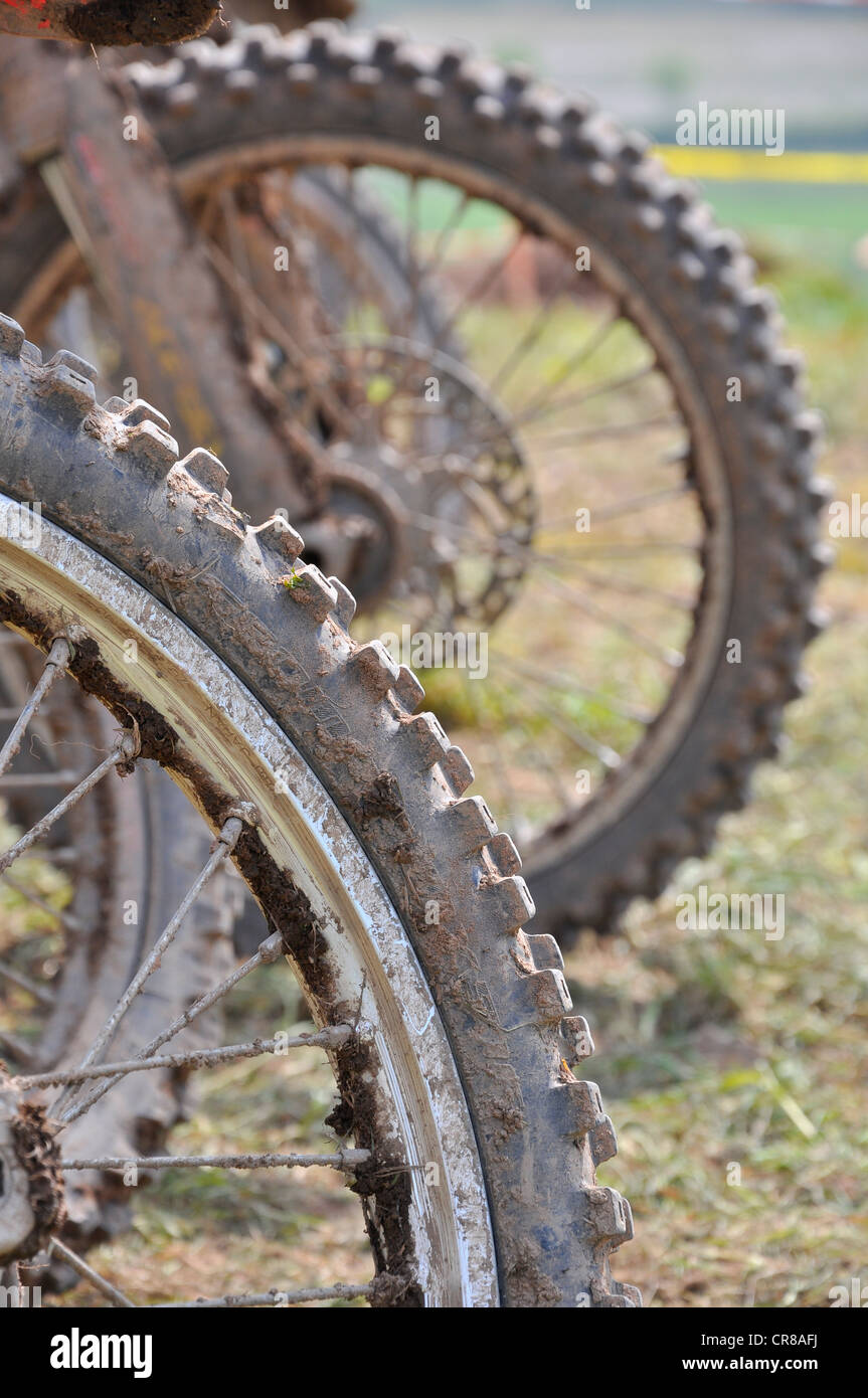 Motocross bike wheels lined up for the start of a race. Stock Photo