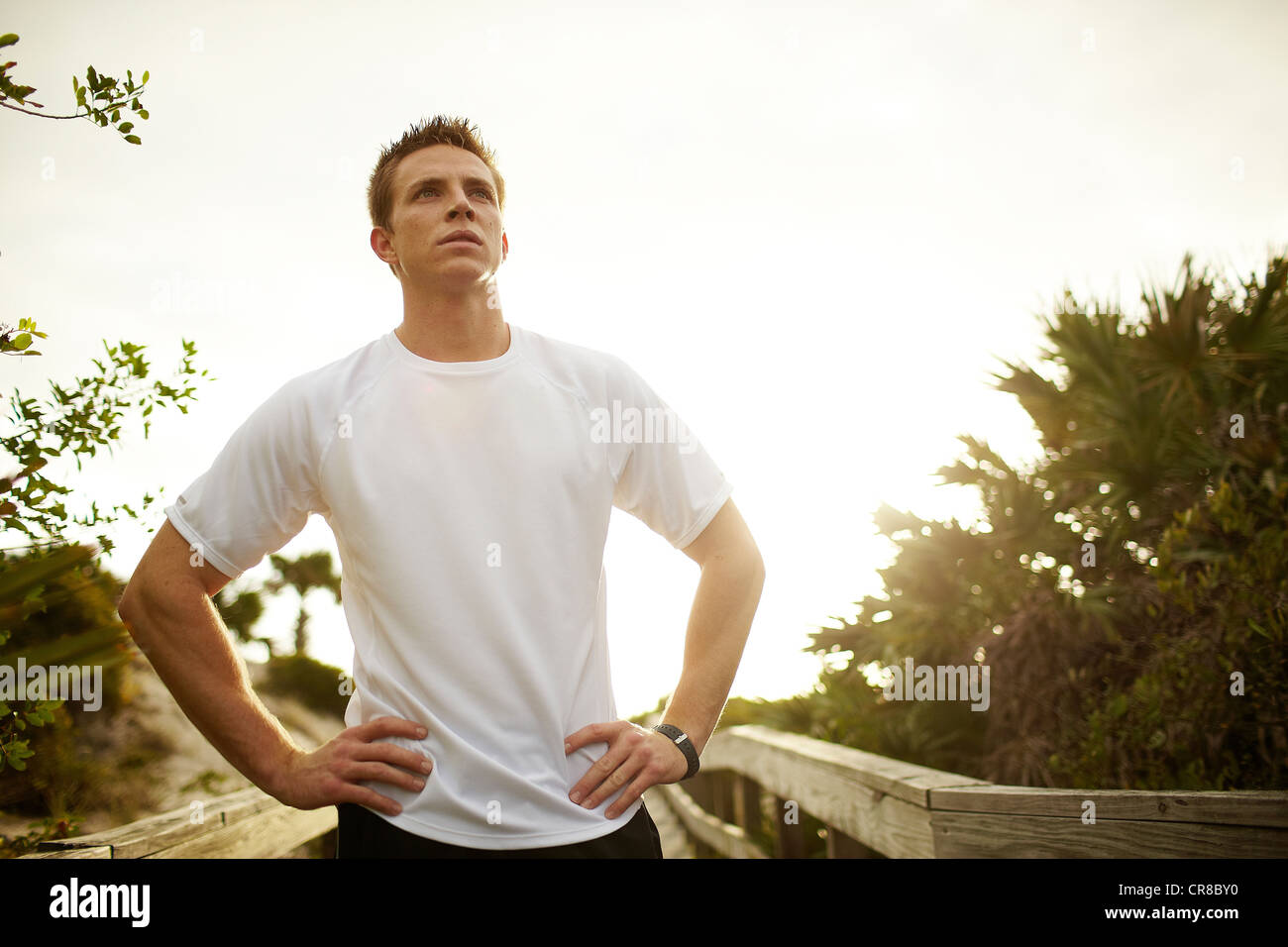 Runner stopping to catch breath and reflect Stock Photo