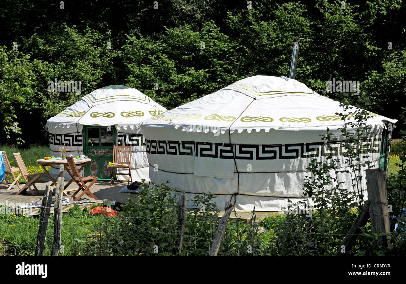 Two Beautiful Yurts on a farm in Sussex the latest thing in camping or glamping Stock Photo