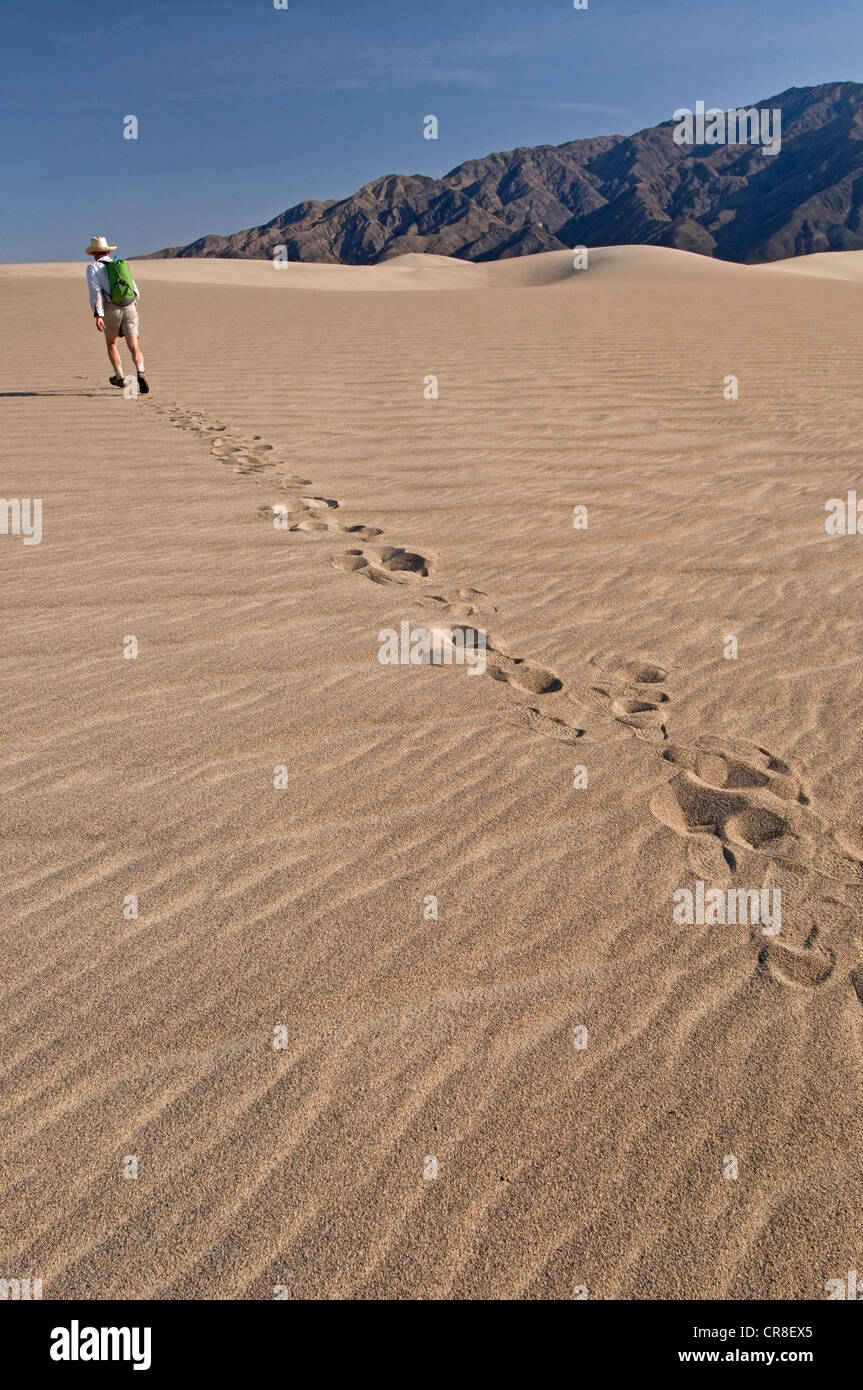Man hiking in Death Valley National Park, California, USA Stock Photo ...