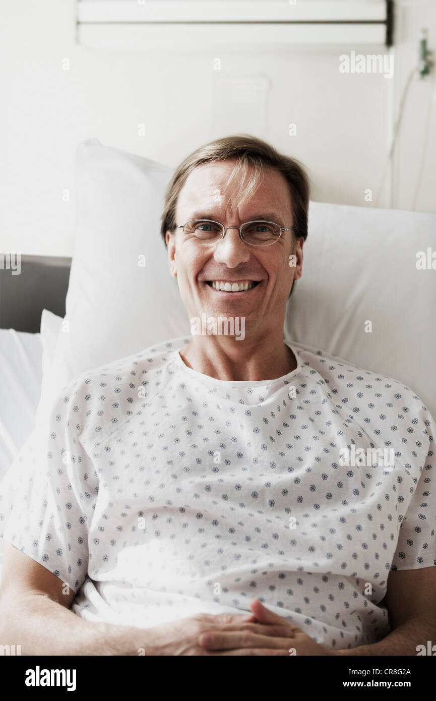 Portrait of mature patient in hospital Stock Photo