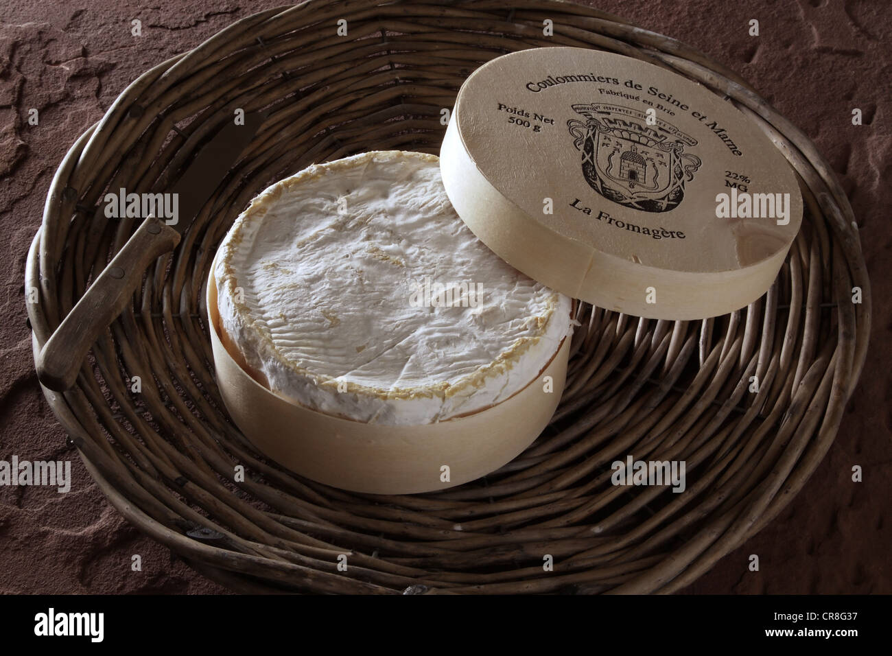 French soft cheese on a basket tray Stock Photo Alamy