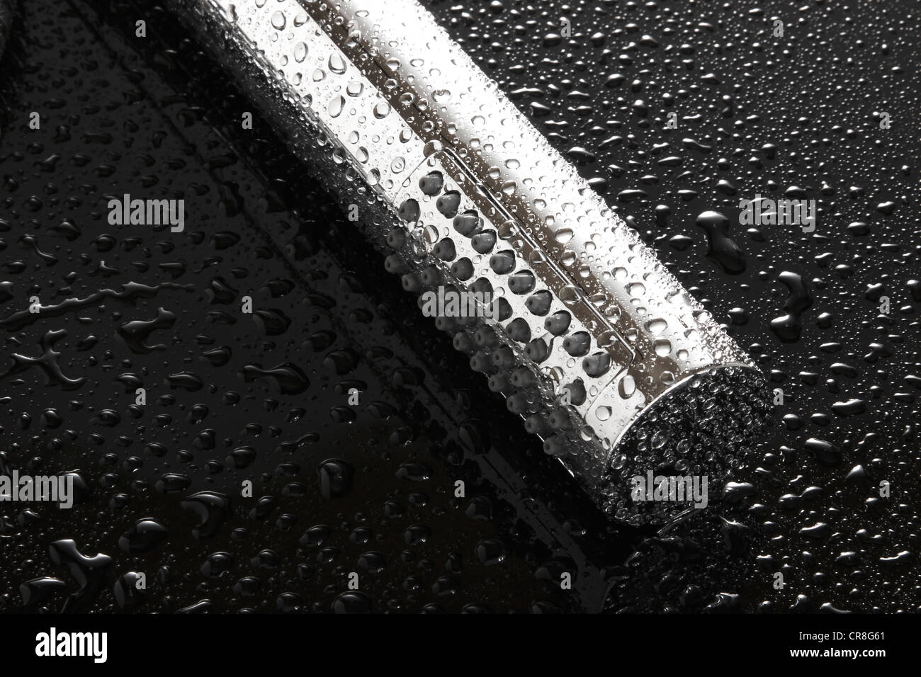 Shower head covered with water drops Stock Photo