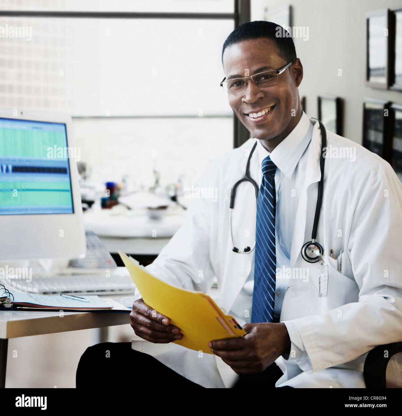 Mature doctor stands in hi-res stock photography and images - Alamy