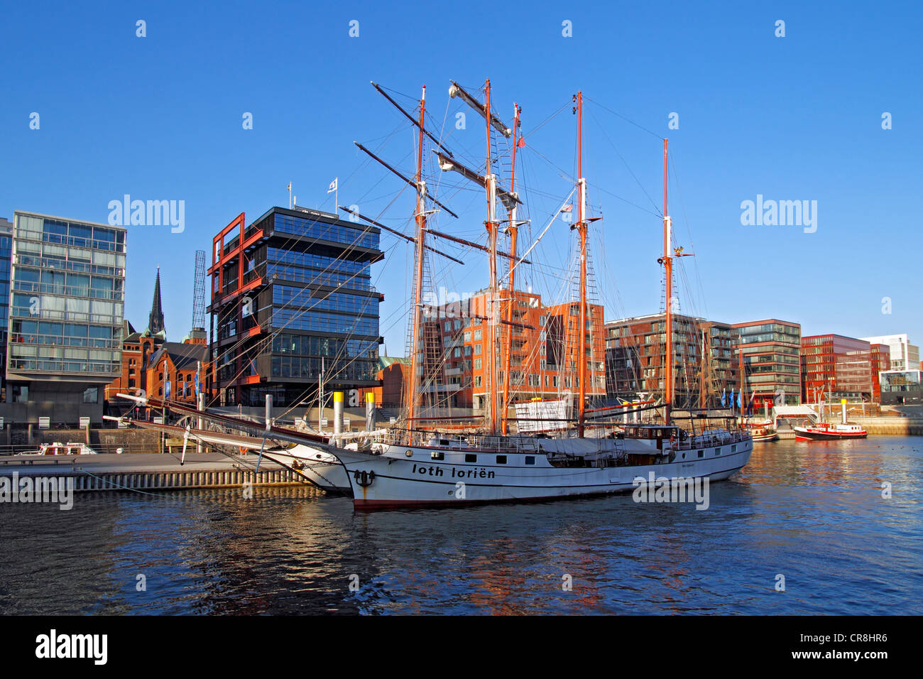 Modern luxury apartments, office buildings, historic ships, Magellan